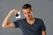 Young man with a camera