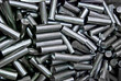 pile of metal pipes in factory