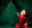 Kleinkind als Weihnachtsmann