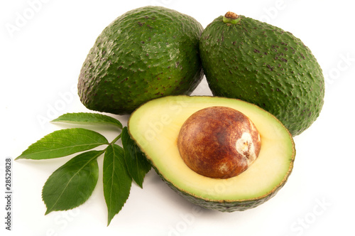 Photo : Ripe Organic Avocado on white background Ripe Organic Avocado on white background