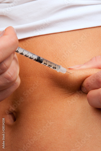 Photo: Syringe abdomen insulin injection Syringe abdomen insulin injection