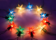 Christmas lights in ring on dark background with copy space.Deco Christmas lights in ring on dark background with copy space.Deco