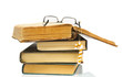 heap of books and glasses on it