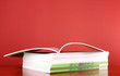 Pile of color magazines  on blue background
