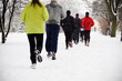 People running in winter park, motion blur People running in winter park, motion blur