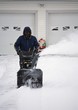 Photo: Man Operating A Snow Blower Man Operating A Snow Blower
