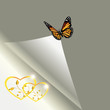 Hearts of gold on a sheet of paper