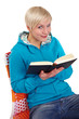 Smiling woman reads a book