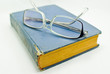 glasses and old book glasses and old book