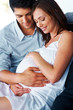 Happy young couple expecting a new baby