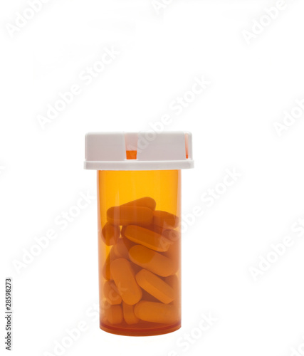 Photo: Pills in a closed prescription bottle Pills in a closed prescription bottle
