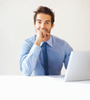 Foto: Business man smiling confidently Business man smiling confidently