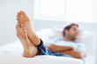 Man relaxing on sofa Man relaxing on sofa