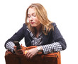Young woman with suitcase and telephone