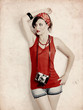 Pin-up girl with a camera Pin-up girl with a camera
