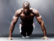 Bodybuilding - Healthy young guy doing push up exercise