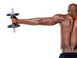 Healthy young guy doing shoulder exercise