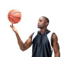 Attractive young man playing with the basketball