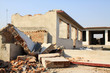 demolition of smoldering rubble