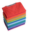 pile of colorful t-shirts freshly folded from the laundry