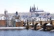 First Snow in Prague, gothic Castle with the Charles Bridge First Snow in Prague, gothic Castle with the Charles Bridge