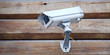 video camera on a wooden wall