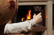 Red wine by the fireplace