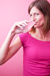 pretty, young woman drinking fresh water from a glass (color ton