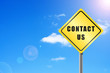 Traffic sign contact us  sky background.