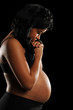 Photo: Young African American Woman Pregnant Praying Young African American Woman Pregnant Praying