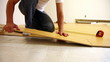 Man Installing Laminate Flooring