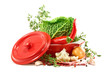 Beautiful vegetables in a red сeramic saucepan