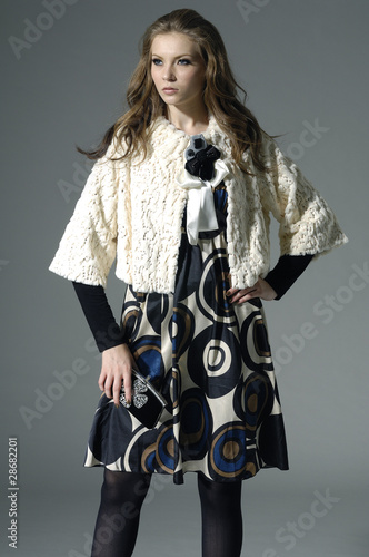 Photo: Beautiful fashion model posing in the studio Beautiful fashion model posing in the studio