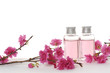 bottle of body lotion with red flower