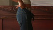 Young woman pulling up jeans