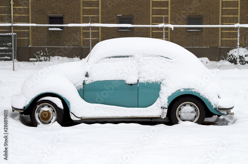 Photo: Snow coverd old timer car Snow coverd old timer car