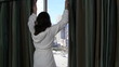 Video: Relaxed woman looks out Las Vegas hotel window - HD Relaxed woman looks out Las Vegas hotel window - HD