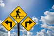 Turn sign and a man walking sign