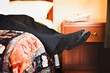 Male Feet Hanging Off Of Bed