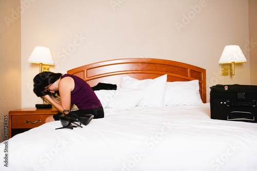 Photo: Woman With Head In Hands Woman With Head In Hands