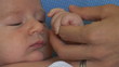 Video: Mother holding newborn baby hand Mother holding newborn baby hand