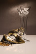 Champagne glasses and mask