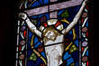 Detail of stained glass religious window in church