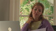 Video: Young woman stressed while working at home with laptop Young woman stressed while working at home with laptop