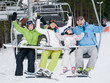 Happy family on ski lift Happy family on ski lift