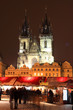 Gothic Tyn Cathedral on snowy Old Town Square, Prague