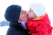Foto: mother and daughter in front of winter landscape mother and daughter in front of winter landscape