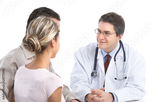Photo: doctor and young couple doctor and young couple