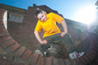 Teenage hip-hop girl on red brick wall