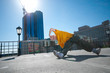 Teenage hip-hop girl dancing over city landscape
